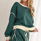 Evergreen Contrast Trim Loose Pullover and Lace-up Waist Skort Set