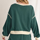 Evergreen Contrast Trim Loose Pullover and Lace-up Waist Skort Set